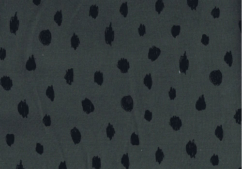 Khakifarbiger Baumwollsweatstoff mit schwarzen Punkten (aufgeraut)