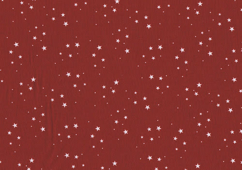 Roter Baumwollstoff mit weißen unterschiedlich großen Sternen